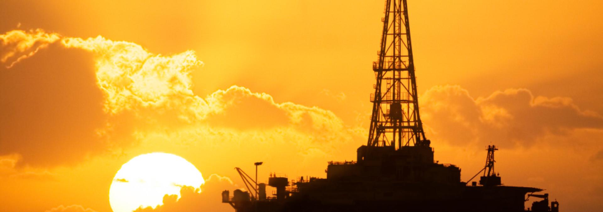 Oil rig and sunset